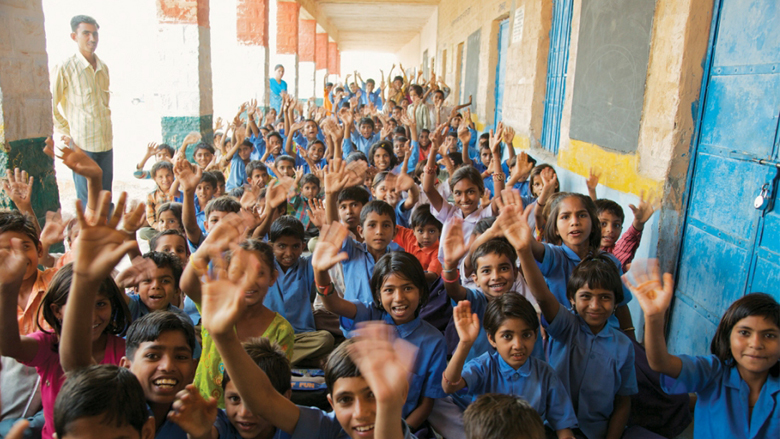 Children with school supplies